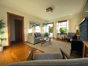 Smart TV, fireplace, books, music library