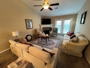 Smart TV, fireplace, books