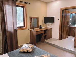 1 chambre, fer et planche à repasser, draps fournis