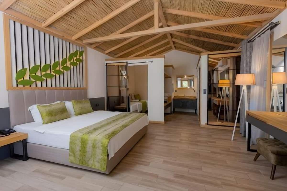Ropa de cama de alta calidad, minibar, caja fuerte y escritorio
