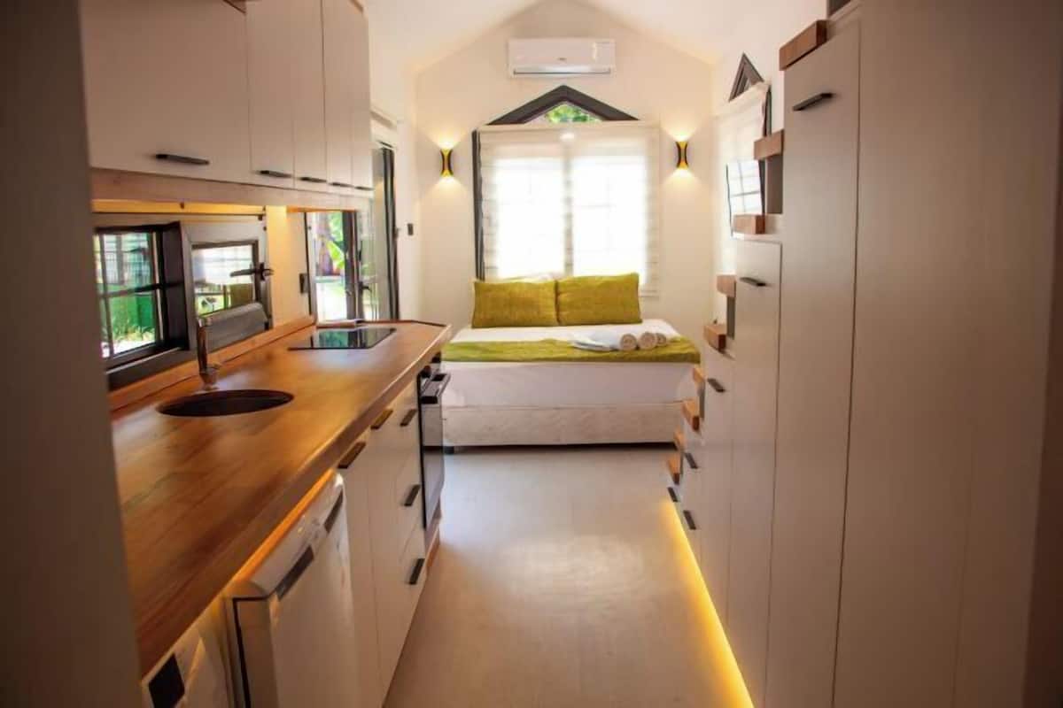 Ropa de cama de alta calidad, minibar, caja fuerte y escritorio