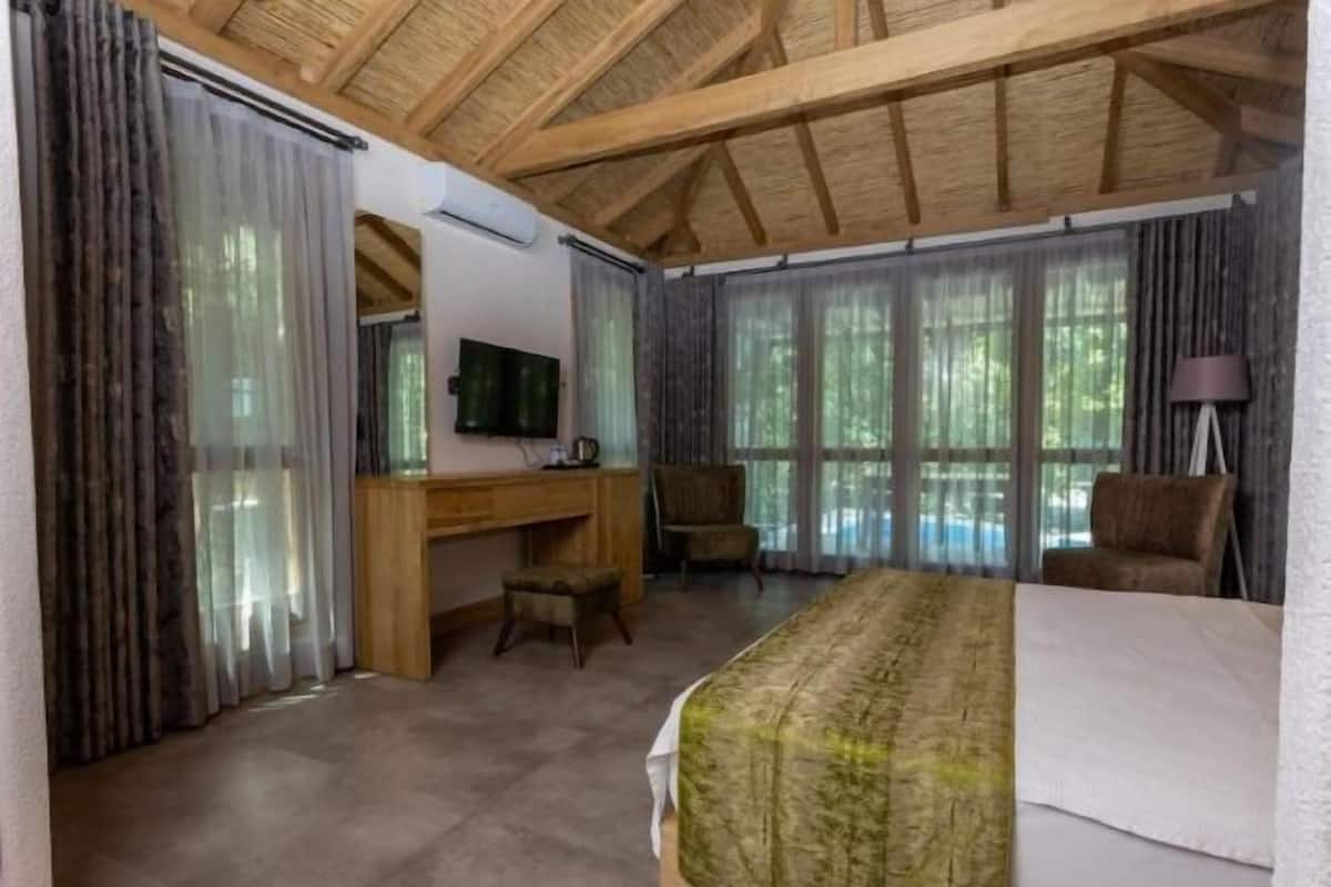 1 habitación, ropa de cama de alta calidad y minibar