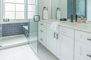 Shower, towels, soap, toilet paper