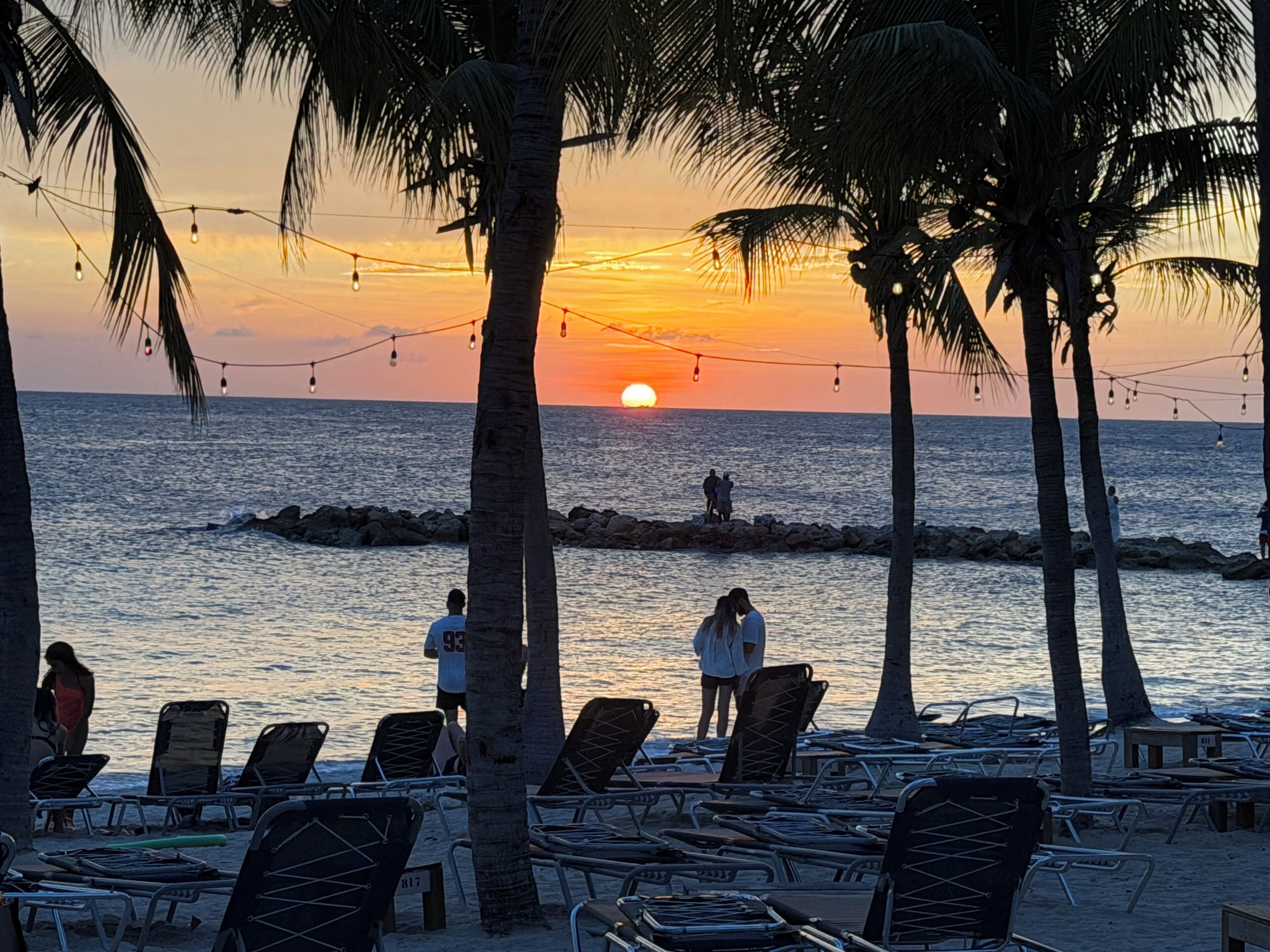 On the beach, sun loungers, beach towels