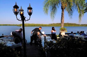 Outdoor dining - Gertrude's Siesta | Bayside Unit, Balcony, Private-Beach, Heated Pools, Pickle, Hot-tub, Tennis! (Siesta Key)