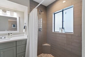 Shower, hair dryer, towels