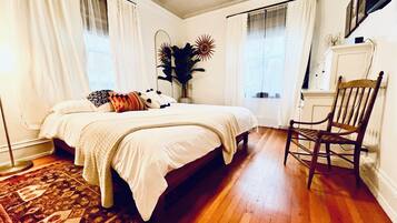 1 bedroom, desk, iron/ironing board, travel crib