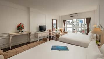 Deluxe Quadruple Room, City View | Soundproofing, free WiFi, bed sheets