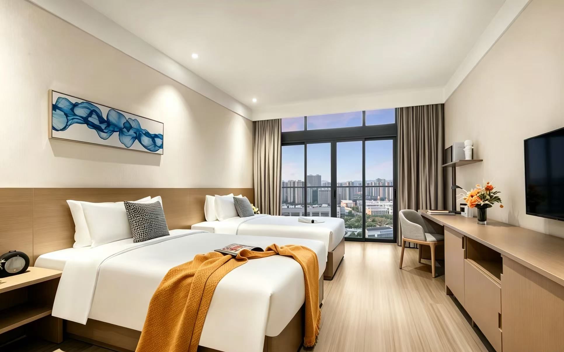 Premium bedding, down duvets, desk, laptop workspace
