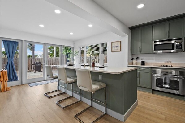 Fridge, microwave, oven, stovetop - Modern and Cozy 3BR Retreat in the Heart of Lake Worth Beach (Lake Worth Beach)