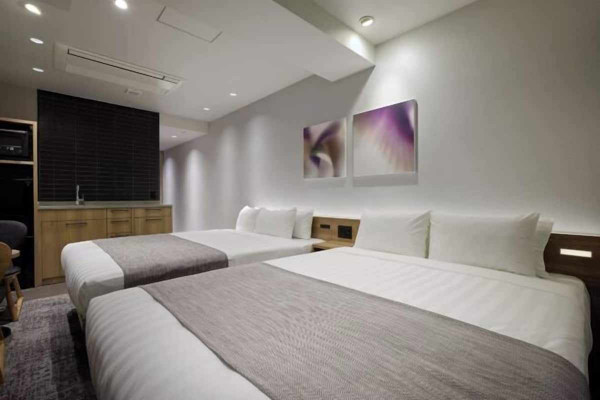 In-room safe, iron/ironing board, WiFi (free), bed sheets