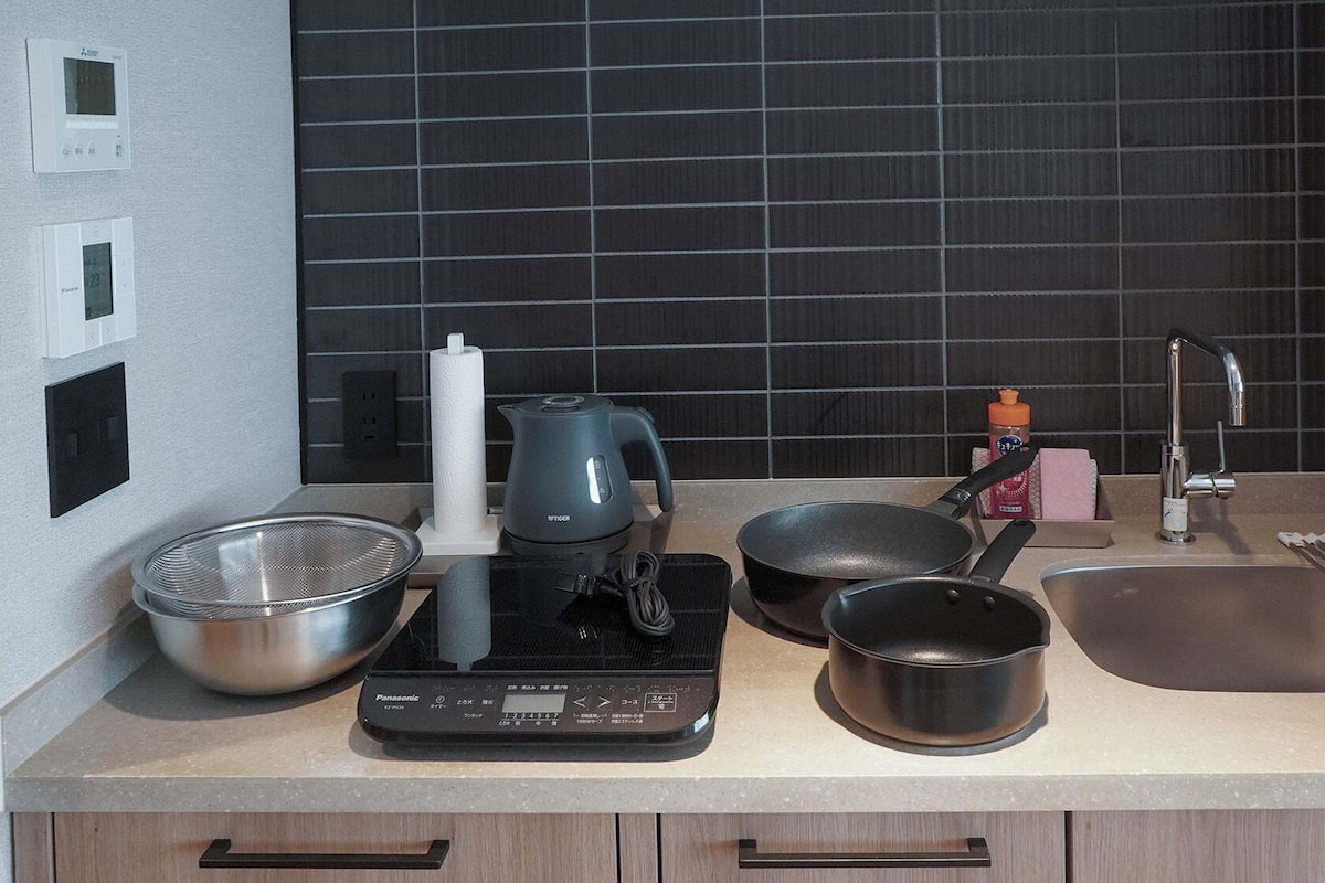 Fridge, microwave, cookware/dishes/utensils