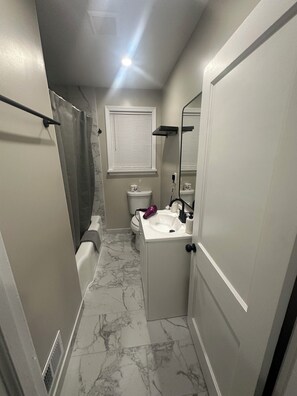 Hair dryer, towels, soap, shampoo