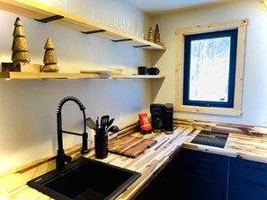 Fridge, microwave, stovetop, coffee/tea maker