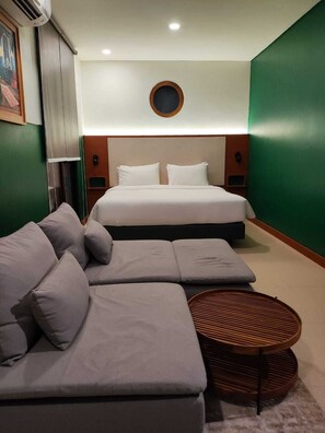 Habitación ejecutiva, no fumadores | Zona de estar | Una televisión