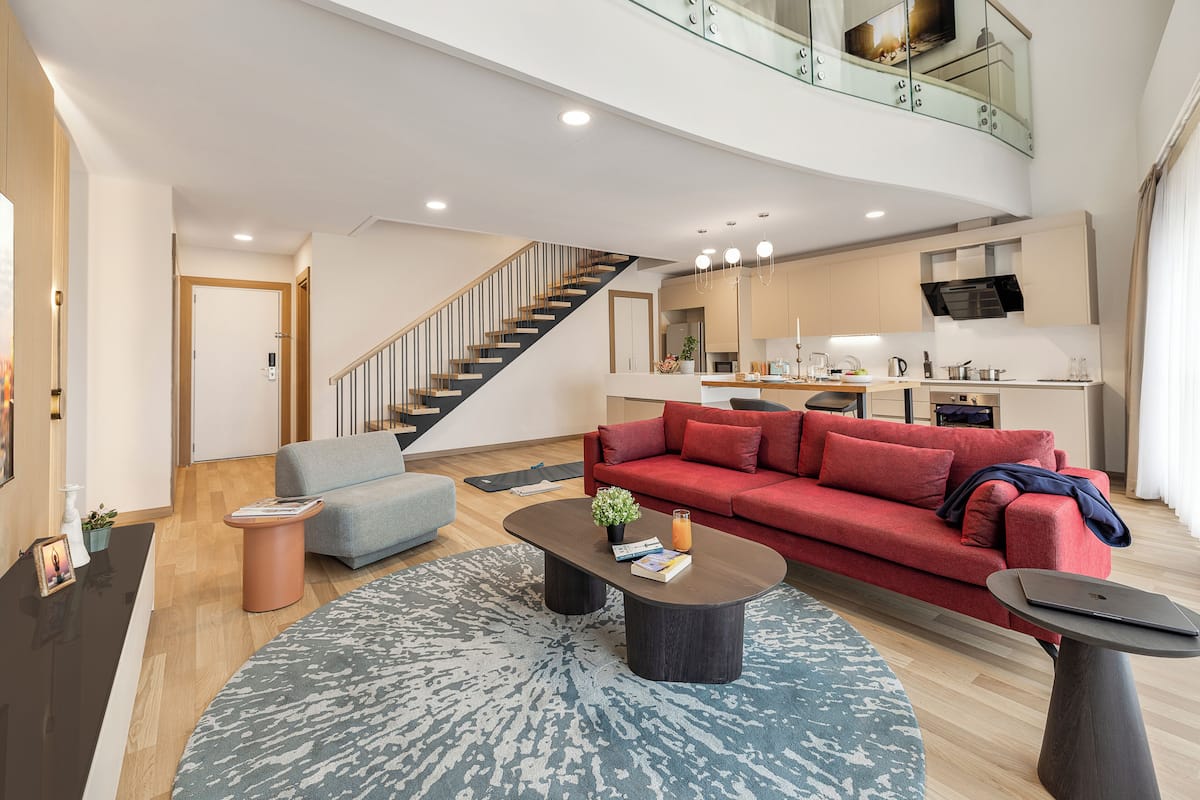 Penthouse, 1 Bedroom | Living area | 40-inch flat-screen TV with cable channels