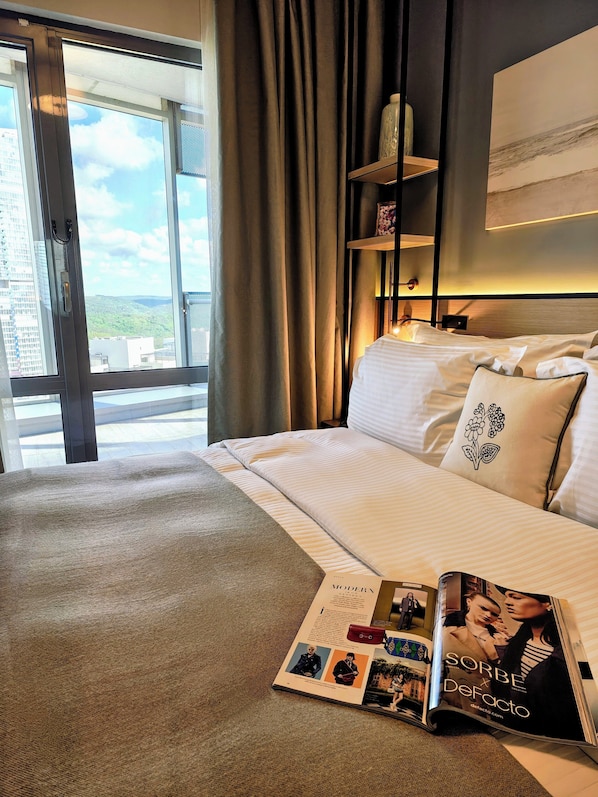 Deluxe Apartment, 1 Bedroom | Down comforters, in-room safe, desk, laptop workspace