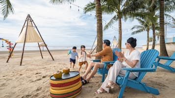 On the beach, free beach shuttle, beach bar