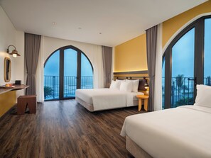 Deluxe Triple Room, Sea View | Desk, blackout curtains, soundproofing, free WiFi
