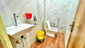 Shower, free toiletries, hair dryer, slippers