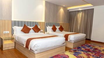 Deluxe Quadruple Room | Individually furnished, desk, laptop workspace, soundproofing