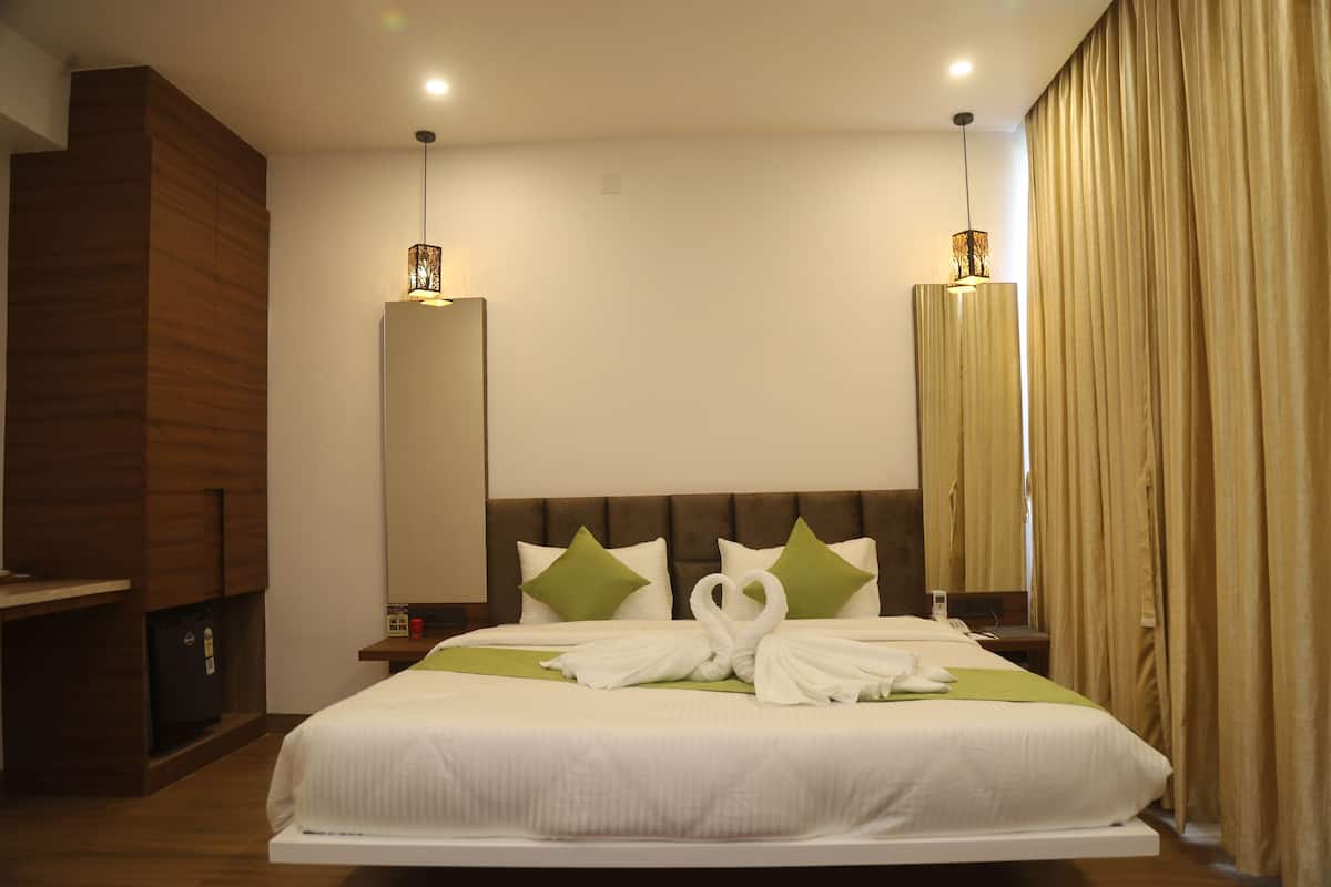 Habitación Deluxe | Tabla de planchar con plancha y wifi gratis