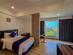Premium Room | Premium bedding, free WiFi, bed sheets - Zip By Spree Hotels Ranjangaon (Shirur)