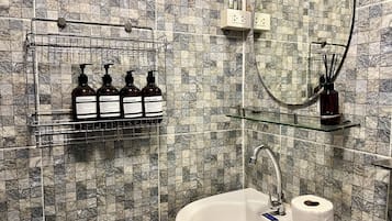 Hair dryer, towels, soap, toilet paper