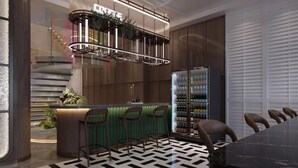 A modern bar area with a curved counter, bar stools, and a wine cooler. - UrCove by Hyatt Lanzhou Xiguan Cross Zhongshan Bridge (Lanzhou)