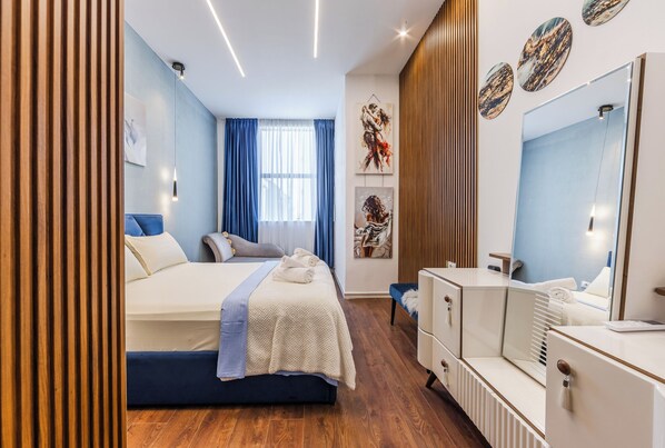 Blackout drapes, iron/ironing board, free WiFi, bed sheets