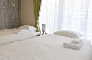 Deluxe Suite, Non Smoking | Desk, iron/ironing board, free WiFi - New Normal Condo in KENCHOMINAMIGUCHI (Naha)