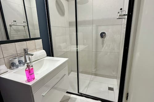 Shower, free toiletries, hair dryer, bathrobes