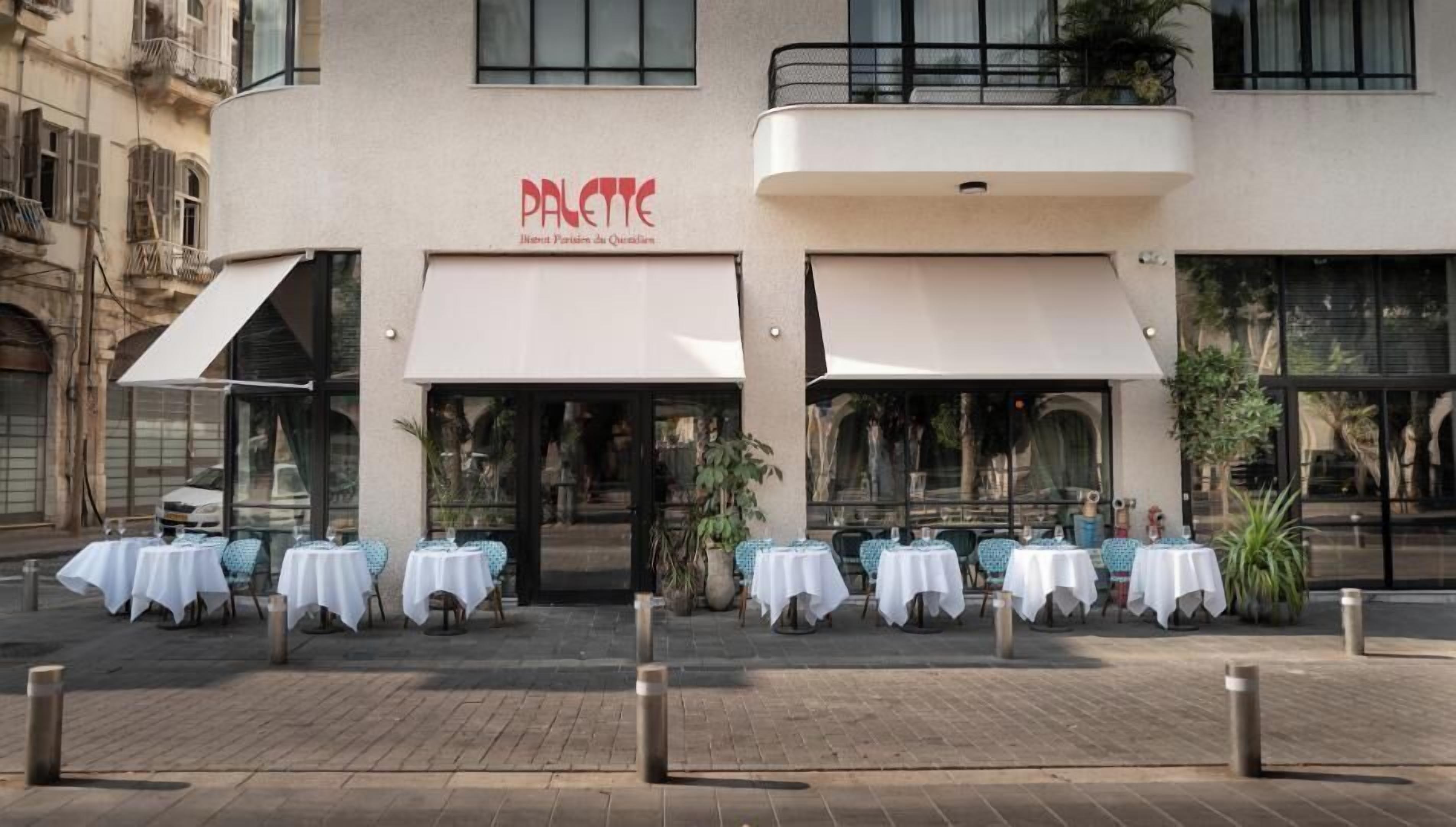 Un restaurante llamado "Pallette" con terraza y fachada moderna.