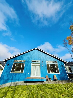 A blue house with a front porch, two windows, and a door. -  BRANCH HOUSE WALK TO MARKET, LAKE. (Anchorage)