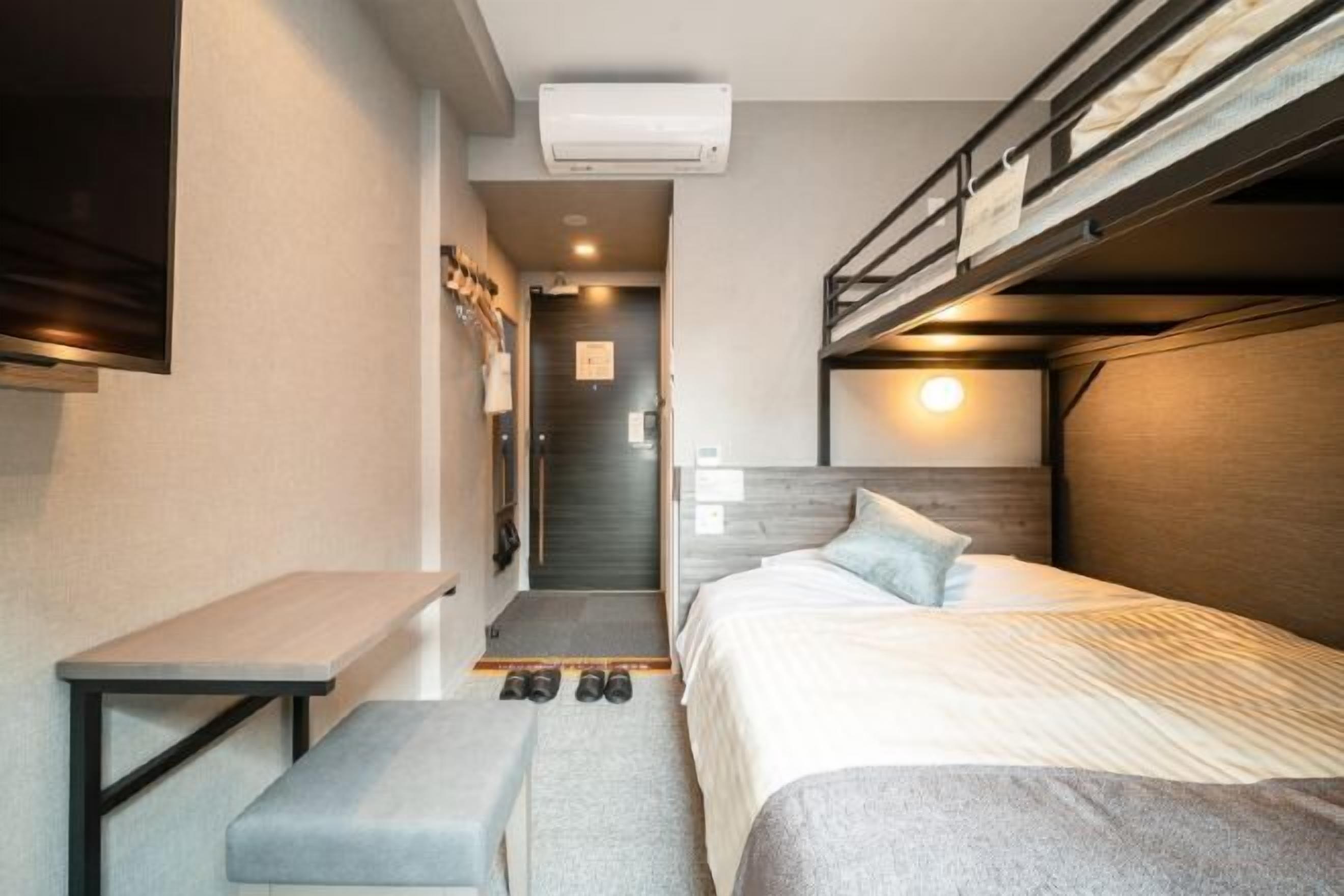 Down duvets, desk, laptop workspace, iron/ironing board