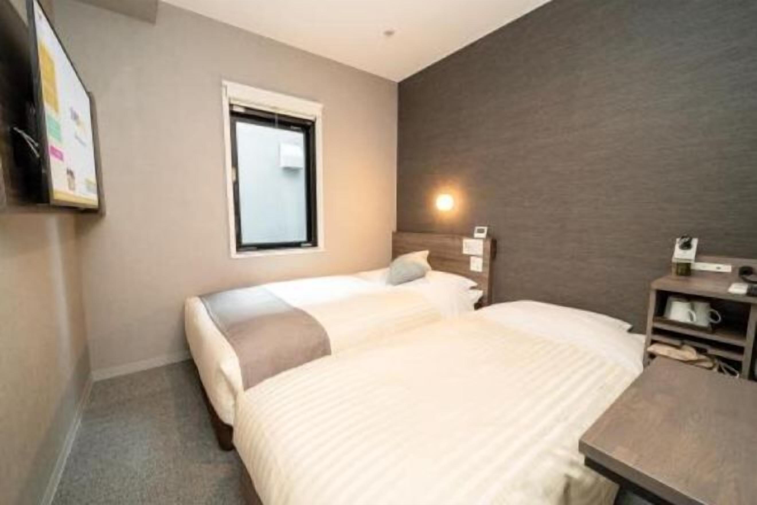 Down duvets, desk, laptop workspace, iron/ironing board