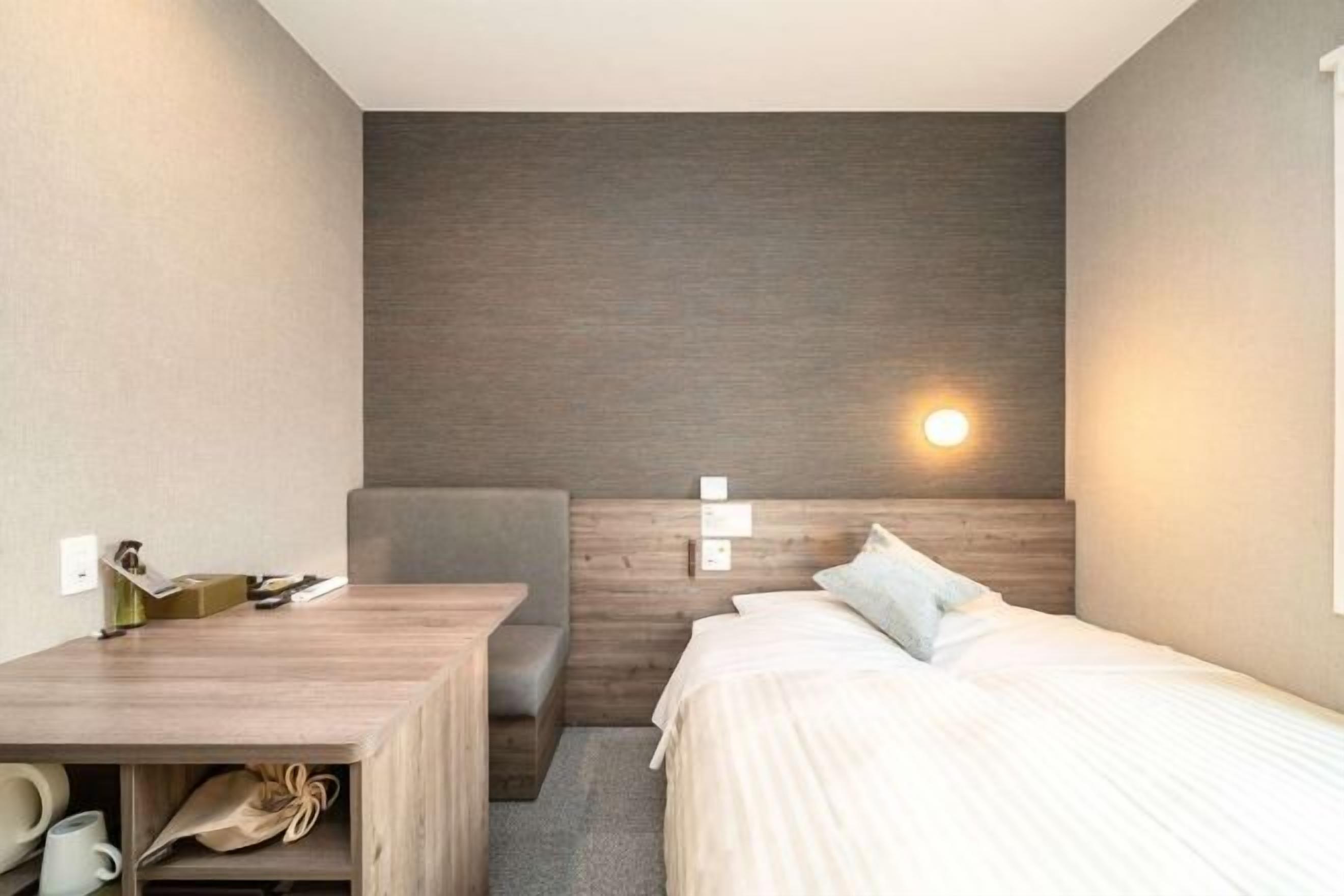 Down duvets, desk, laptop workspace, iron/ironing board