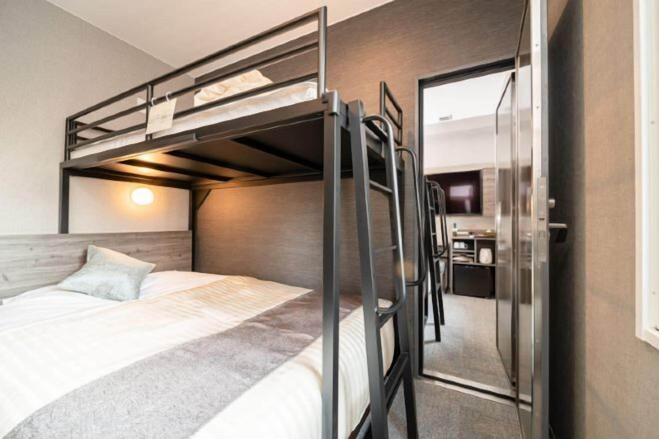 Down duvets, desk, laptop workspace, iron/ironing board