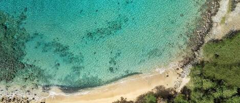 On the beach, sun loungers, beach towels