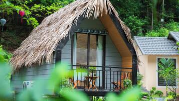 Deluxe Bungalow, Mountain View | Minibar, blackout drapes, soundproofing, free WiFi