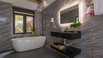 Rainfall showerhead, designer toiletries, hair dryer, slippers