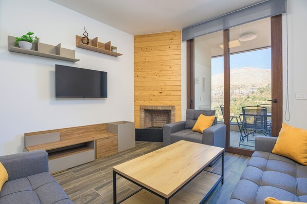 TV connectée de 42 pouces avec chaînes par câble, cheminée