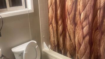 Hair dryer, towels, soap, toilet paper