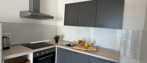 Fridge, oven, electric kettle, cookware/dishes/utensils