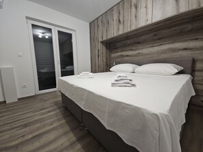 2 quartos, Wi-Fi de cortesia, roupa de cama