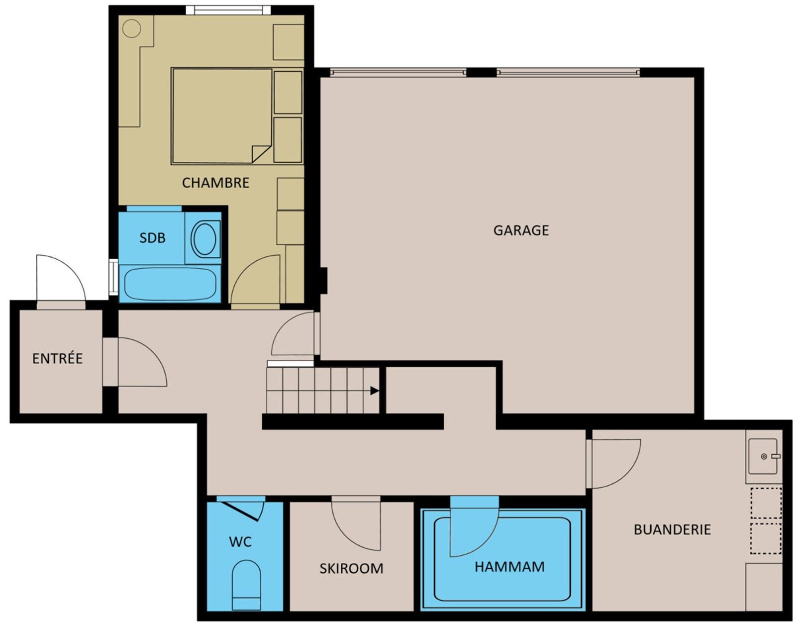 A floor plan with a living room, kitchen, bathroom, garage, and a small storage area.