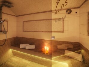 A bathroom with a bathtub, a shower, and a towel rack. - Luxury chalet 5★, 6 pers, hammam, near slopes, 3 bedrooms (La Clusaz)