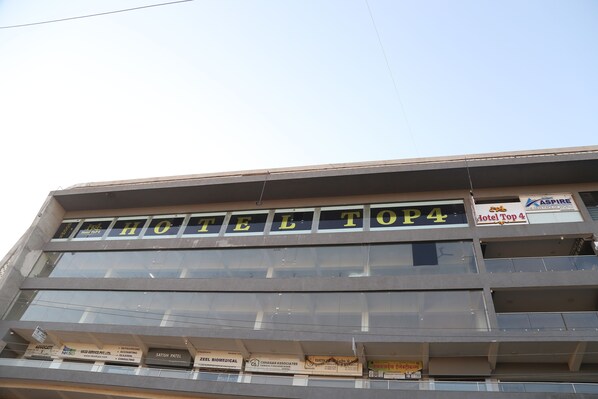 A multi-story building with the sign "HOTEL TOP4" prominently displayed. - HOTEL TOP 4  (Palanpur)