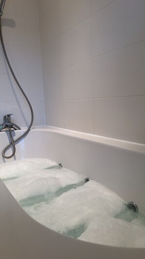 Jetted tub, towels, soap, toilet paper