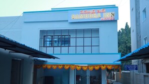 A two-story building with a sign for Samudra Inn. - samudra inn (Nalgonda)